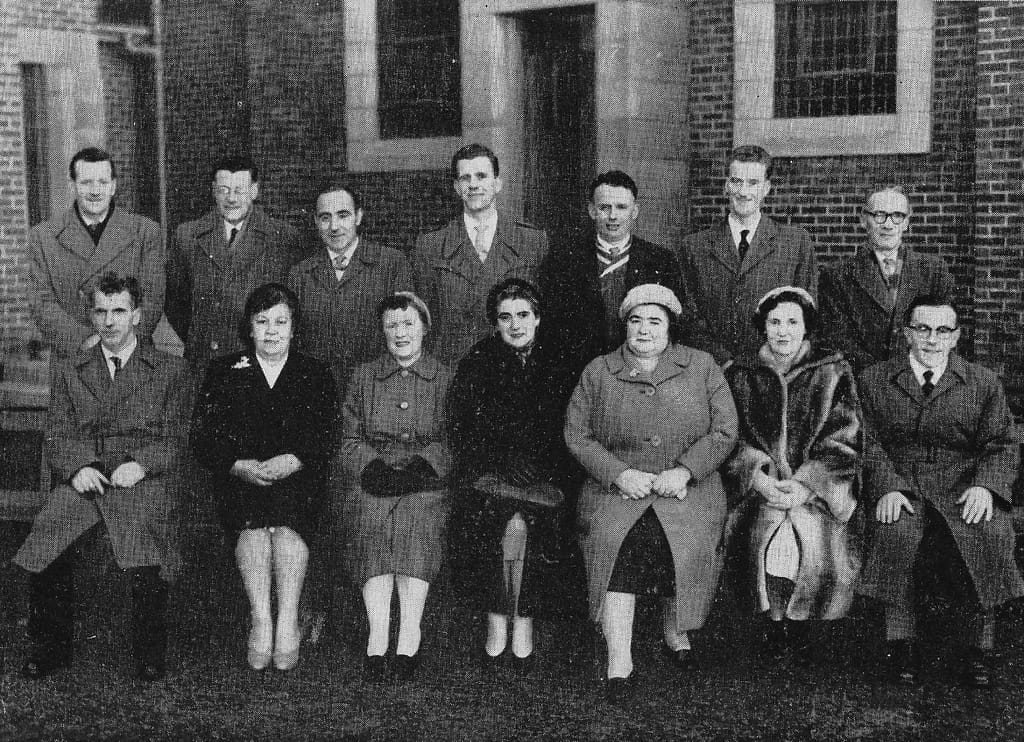 Group of parish committee members in posed photograph
